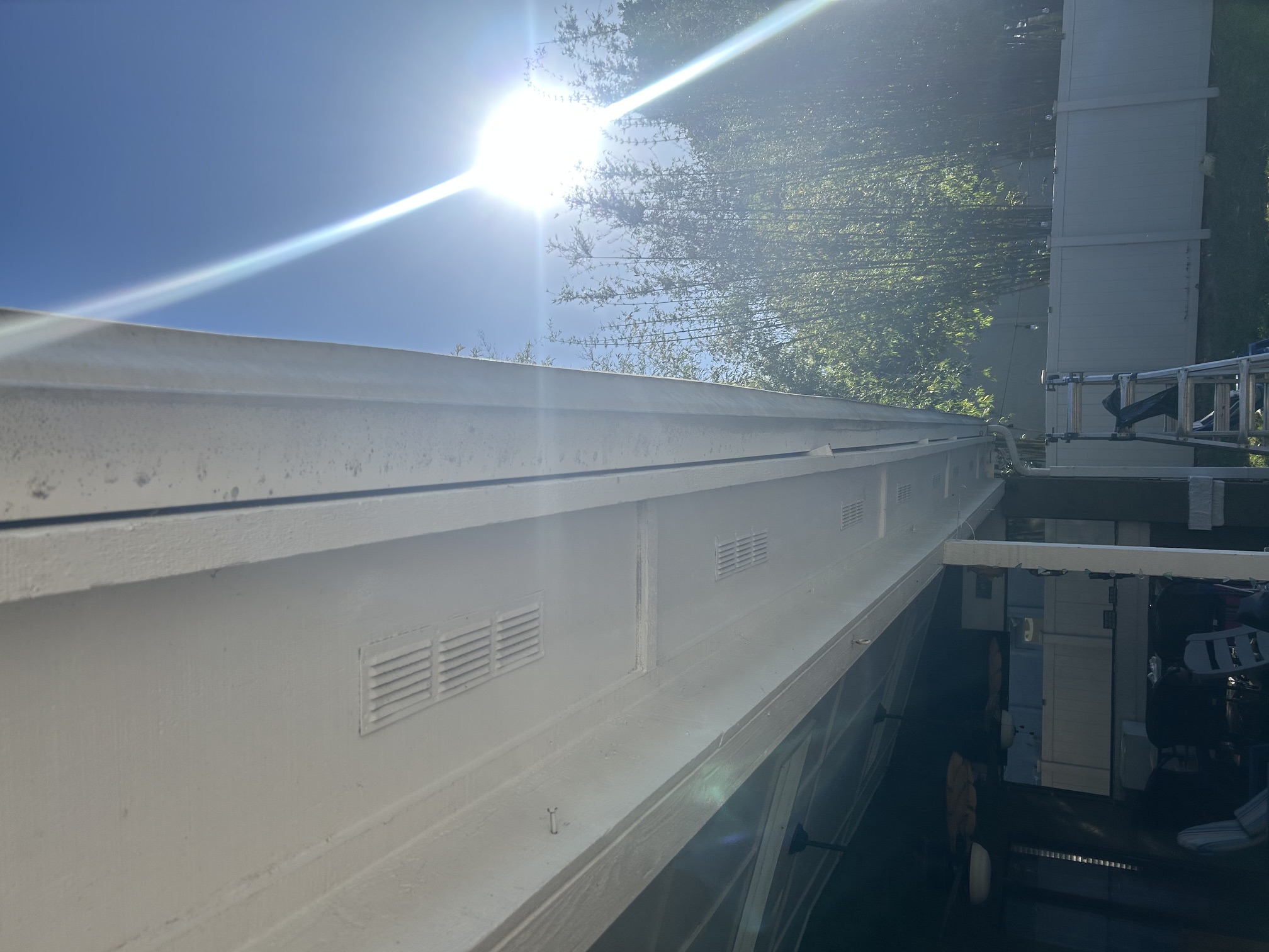 Soffit vents and gutter line checked over during a service call